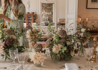 Maison Fête table styling workshop in London with vintage glassware and linen tablecloths.