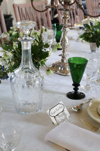 Large 19th century antique decanter with cut glass details and faceted stopper