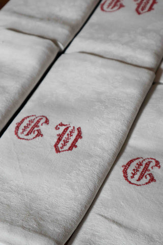 Large antique French napkins with red embroidery and damask weave