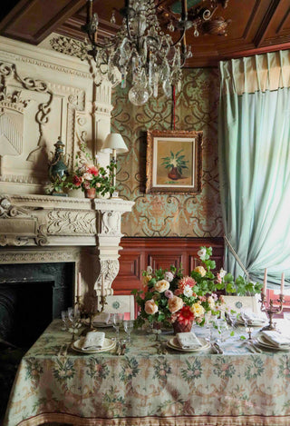 Cotton linen tablecloth inspired by antique tapestry design in sage, peach, and patina blue