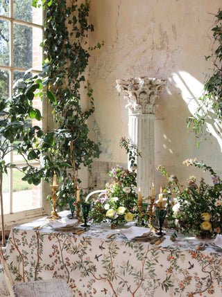 Chinoiserie tablecloth in chalk white with floral branches, birds, and butterflies