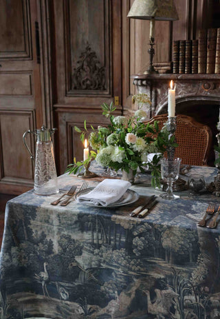 Verdure tapestry tablecloth by Zardi & Zardi for Maison Fête with forest and river scene
