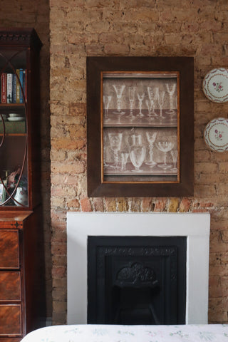 Large framed textile artwork with fabric-covered brown and gold frame