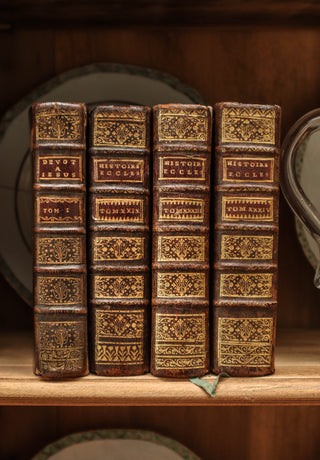 18th century French book set Historie Ecclésiastique with leather and gilt tooling
