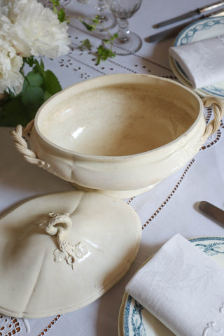 Elegant antique French tureen with pedestal base and sculpted grape lid handle