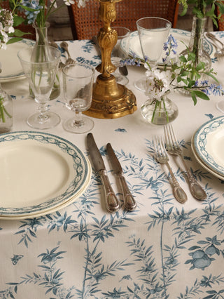 Chinoiserie tablecloth with floral branches, butterflies, and exotic birds in blue