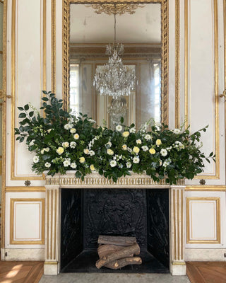 Floral design on a mantle in a french chateau in paris 