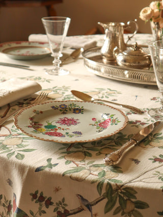Pair of antique scalloped porcelain plates with colourful floral painting