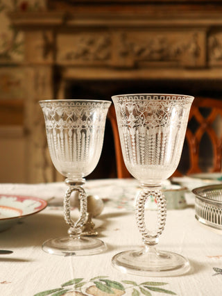 Pair of 18th-century etched wine glasses with baluster stems