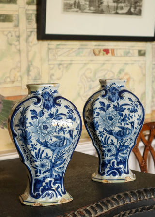 Pair of antique Delft blue and white vases with bird and floral designs