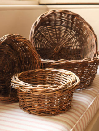 Round rustic nesting baskets arranged together as a set