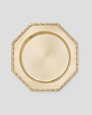 Octagonal polished brass charger plate with bamboo-jointed rim - The Bamboo Charger Plate, available to hire from Maison Fête et Cie.