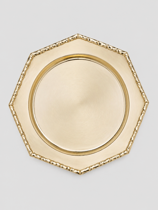 Octagonal polished brass charger plate with bamboo-jointed rim - The Bamboo Charger Plate, available to hire from Maison Fête et Cie.