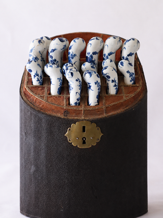 Fish-skin case interior showing 12 knives and 12 forks, 18th century. Peter Hoane Collection.