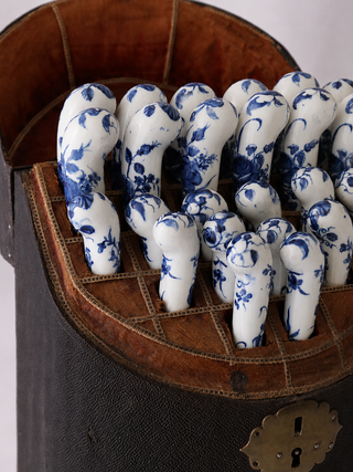 Complete set of 12 Worcester porcelain handled knives and forks in open fish-skin case. Shop antiques worldwide shipping.