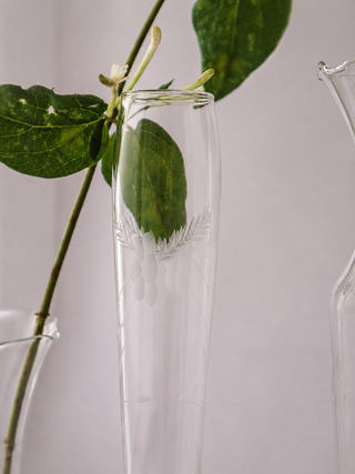 Close-up of four antique etched glass bud vases with sterling silver gadrooned bases. shop antique tableware london