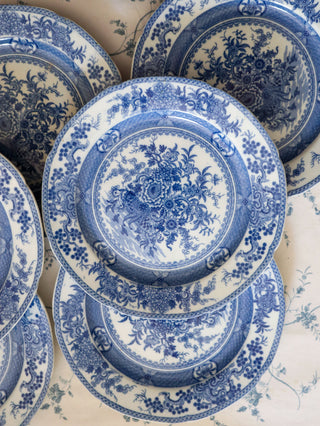 Detail of chinoiserie transferware pattern showing peony, chrysanthemum, and trailing blossom border
